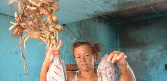 Esta es una de las caras más conocidas en el balneario de Comate. Doña Francia Severino administra aquí desde hace 22 años un puesto de fritura.  Glauco Moquete