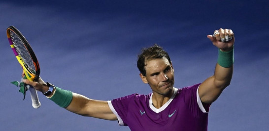 El español Rafael Nadal celebra después de derrotar al estadounidense Denis Kudla durante el partido de tenis de dieciseisavos de final masculino ATP Open 500 de México en el Arena GNP, en Acapulco, México, el 22 de febrero de 2022.
PEDRO PARDO / AFP