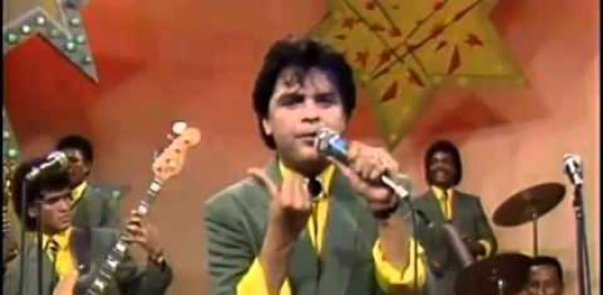 Presentacion 1987 En el show Del Mediodia Cantanto Su Exito Mas Grandes Junto A La Orquesta de Wilfrido Vargas Leo Diaz De Venezuela, Cantando El Tema De Jose Miguel Classe (El Gallito De Manati) Salvame. Desde La Producion La Musica Grabada En 1986 Creditos:Djpagoza