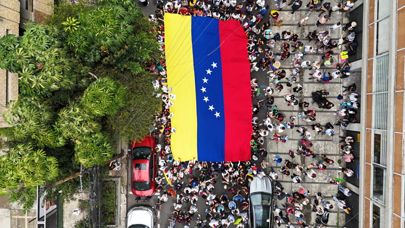 Venezuelans residing in Costa Rica demonstrate to demand political change in their country on election day in San Jose, Costa Rica, July 28, 2024. Venezuelans vote Sunday between continuity in President Nicolas Maduro or change in rival Edmundo Gonzalez Urrutia amid high tension following the incumbent's threat of a 