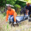 Brigadas de la Defensa Civil y de la Policía Científica levantan los cadáveres de 4 jóvenes asesinados en Rancho Arriba, de San José de Ocoa.