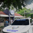 Un vehículo de la Dicrim estacionado en el restaurante Villar Hermanos, ubicado en el sector Gazcue, tras el incidente que ha dejado un hombre herido de bala.