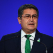 El presidente de Honduras, Juan Orlando Hernández, presenta su declaración nacional como parte de la Cumbre de Líderes Mundiales de la Conferencia de las Naciones Unidas sobre Cambio Climático COP26 en Glasgow, Escocia, el 1 de noviembre de 2021.