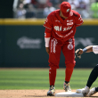 New York Yankees' Osvaldo Cabrera (R) touches the second base next to Mexico's Diablos Rojos Robinson Cano (L) during the first inning of the first exhibition baseball game at the Alfredo Harp Helu stadium in Mexico City on March 24, 2024.