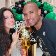 Amelia Vega y Al Horford.