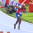 El dominicano Alexander Ogando mientras corría por el carril número de la competencia.