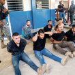 Parte de los colombianos detenidos por el asesinato del presidente haitiano Jovenel Moise, en la Dirección General de la policía en Puerto Príncipe, Haití. AP
