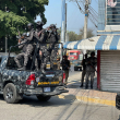Agentes especiales de la Policía Nacional y miembros del Ejército ocuparon Navarrete para controlar las protestas. onelio domínguez/ Listin Diario