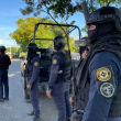 Fuerzas policiales alertas en una calle de San Francisco de Macorís
