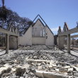 La iglesia Waiola destruida se muestra después de un incendio forestal, el viernes 11 de agosto de 2023, en Lahaina, Hawái.