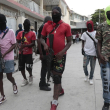 Miembros armados del “G9 y la Familia” marchan en una protesta contra el primer ministro haitiano, Ariel Henry, en Puerto Príncipe, Haití, el martes 19 de septiembre de 2023.