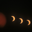 This multi-exposure image shows the annular solar eclipse as seen from the Pierre & Marie Curie School in Managua on October 14, 2023. OSWALDO RIVAS / AFP