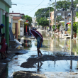 Las inundaciones causaron daños y muertes en el sector Manoguayabo, en Santo Domingo Oeste.
