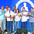 Dirigentes y candidatos del PRM celebran el triunfo logrado en las elecciones municipales.