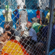 Los reclusos se reúnen dentro de la Penitenciaría Nacional en el centro de Puerto Príncipe, Haití, el domingo 3 de marzo de 2024. Cientos de reclusos huyeron de la prisión principal de Haití después de que bandas armadas irrumpieran en las instalaciones durante la noche.