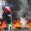 Las calles de Puerto Príncipe estaban ayer bajo el fuego provocado por las pandillas armadas que reclaman la renuncia del primer ministro Ariel Henry.