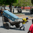 A man pulls a cart with a casket through a street in Port-au-Prince, Haiti, March 22,2024. More than 33,000 people fled Port-au-Prince this month as the Haitian capital was overrun by well-armed gangs triggering political chaos in the impoverished Caribbean nation, the United Nations has said. (Photo by Clarens SIFFROY / AFP)