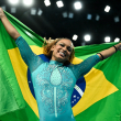 La brasileña Rebeca Andrade celebra ganar la medalla de oro al final de la final de ejercicios de suelo femeninos de gimnasia artística durante los Juegos Olímpicos de París 2024 en el Bercy Arena de París, el 5 de agosto de 2024.