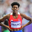 Dominican Republic's Marileidy Paulino celebrates after winning the women's 400m final of the athletics event at the Paris 2024 Olympic Games at Stade de France in Saint-Denis, north of Paris, on August 9, 2024. (Photo by Martin  BERNETTI / AFP)