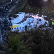 Aerial view of the wreckage of an airplane that crashed with 61 people on board in Vinhedo, Sao Paulo State, Brazil, on August 9, 2024. - An airplane carrying 57 passengers and four crew crashed on August 9 in Brazil's Sao Paulo state, killing everyone on board, local officials said. The aircraft, a French-made ATR 72-500 operated by the airline Voepass, was travelling from Cascavel in southern Parana state to Sao Paulo's Guarulhos international airport when it crashed in the city of Vinhedo. (Photo by Miguel SCHINCARIOL / AFP)