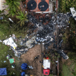 This photo shows an aerial view of the wreckage of an airplane that crashed with 61 people on board in Vinhedo, Sao Paulo State, Brazil, on August 10, 2024. - An airplane carrying 57 passengers and four crew crashed on August 9 in Brazil's Sao Paulo state, killing everyone on board, the airline said. The aircraft, an ATR 72-500 operated by Voepass airline, was traveling from Cascavel in southern Parana state to Sao Paulo's Guarulhos international airport when it crashed in the city of Vinhedo. (Photo by Nelson ALMEIDA / AFP)