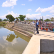 Primer ministro Haitiano en el canal construido en aguas del Río Masacre