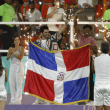 EVE3998. SANTIAGO DE LOS CABALLEROS (REPÚBLICA DOMINICANA), 16/10/2024.- El cantante Manny Cruz (i) y la atleta Marileidy Paulino (d) participan en la inauguración Copa Mundial Femenina sub-17 este miércoles, antes de un partido del grupo A entre las selecciones de República Dominicana y Ecuador, en el estadio Cibao en Santiago de los Caballeros (República Dominicana). EFE/ Diana Sánchez