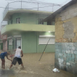 La fotografía muestra inundaciones en Santiago de los Caballeros