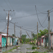 A man walks on a street during the pass of the Hurricane Rafael's eye in Pueblo Candelaria, Artemisa Province, 65 km west of Havana, on November 6, 2024. - Hurricane Rafael knocked out power to all of Cuba on Wednesday as it made landfall on the island still reeling from a recent blackout and a previous major storm, the national power company said. (Photo by ADALBERTO ROQUE / AFP)