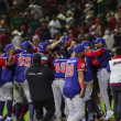 Jugadores de los Leones celebran la victoria 1-0 ante los Charros de Jalisco, que los corona como los nuevos campeones de la Serie del Caribe.