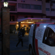 Ambulancia del Inacif sale del condominio Naco IV Dorado