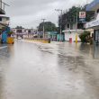Calle inundada en Tamayo, municipio de la provincia Bahoruco.