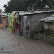 Los residentes en Baní quedaron atrapados en sus casas por las inundaciones.
