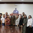 El ministro de Educación Superior, Ciencia y Tecnología (Mescyt), Franklin García Fermín, junto aparte de los estudiantes seleccionados para el programa de portugués por inmersión.
