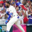 Junior Caminero, de República Dominicana, recorre las bases tras conectar un jonrón contra Nicaragua durante la sexta entrada del partido del Grupo D del Clásico Mundial de Béisbol.