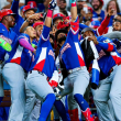 Integrantes del equipo dominicano celebran uno de los trece cuadrangulares que que conectaron en la primera ronda del Clásico Mundial.