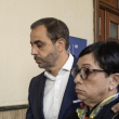 Los hermanos Antonio y Maribel Espaillat camino a una sala de audiencias por el caso Jet Set. El Ministerio Público asegura tener un expediente contundente en su contra.