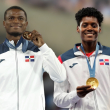 Los medallistas olímpicos Marileidy Paulino y Cristian Pinales.