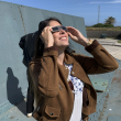Mar Gómez, doctora en Ciencias Físicas y meteoróloga, observa el sol con unas gafas homologadas para ver el eclipse del 12 de agosto en el Monte de San Pedro, en A Coruña. La incógnita sobre si el cielo estará despejado para el eclipse total de sol. EFE/Paula Fernández