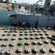 Agentes de la Dirección Nacional de Control de Drogas (DNCD) incautan un cargamento de 1,360 paquetes de presunta cocaína (1.3 toneladas) y apresaron a tres dominicanos tras una ardua persecución por aire, mar y tierra en las costas del municipio de Baní, provincia Peravia.