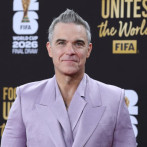 Robbie Williams supera a The Beatles con récord de álbumes número uno en el Reino Unido
