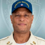 Aplazan media de coerción contra coronel de la Policía que agredió joven en Los Mina