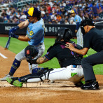 Los Brewers superan la temprana lesión de Dustin May para derrotar a los Mets por 8-1.