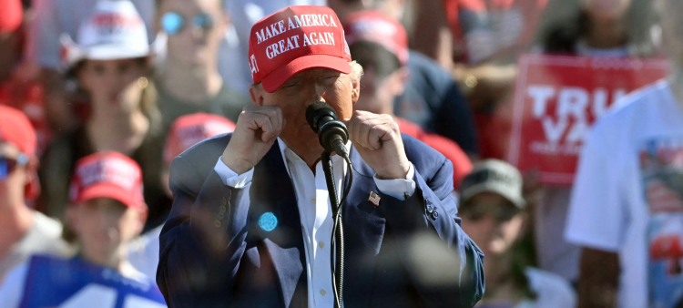 Former US President and Republican presidential candidate Donald Trump speaks during a campaign rally at the Aero Center in Wilmington, North Carolina, September 21, 2024. (Photo by Jim WATSON / AFP)