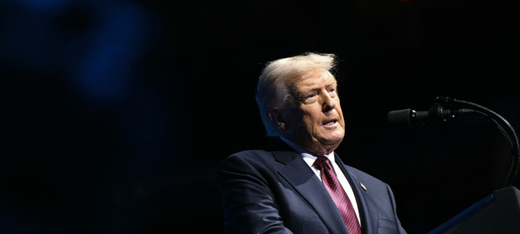 US President Donald Trump speaks at the American Business Forum at the Kaseya Center in Miami on November 5, 2025. (Photo by Brendan SMIALOWSKI / AFP)