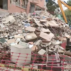 Damnificados lloran pérdida de sus recuerdos durante demoliciones en México