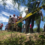 Haitianos lloran a 8 compatriotas ahogados junto a un dominicano; iban 17 en un carro