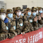 El número de casos diarios de coronavirus fuera de su epicentro en Hubei baja por quinto día consecutivo