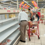 Largas filas y poco distanciamiento: los efectos de Isaías en supermercados del Gran Santo Domingo