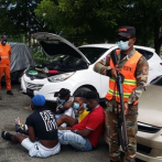 Apresan a cinco haitianos con un paquete presuntamente de droga cuando les daban asistencia vial por falla mecánica
